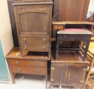 A walnut cased music centre with two speakers, a stained pine fire surround,