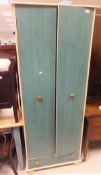 A two door pine effect wardrobe,