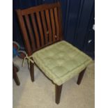 A set of six modern teak slat back chairs