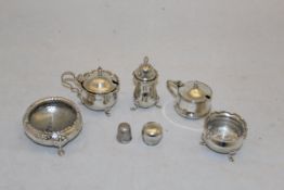 A collection of various silver and plated cruet items, to include lidded mustard, pepper,