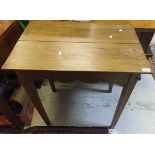 A 19th Century elm occasional table, the plain top above a shaped apron,