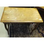A 19th Century oak Arts and Crafts style table, the plain top with two drawers,
