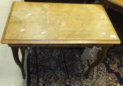 A 19th Century oak Arts and Crafts style table, the plain top with two drawers,