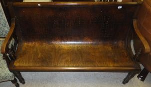 A bentwood and beech railway style bench with pierced decoration,