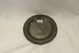 An English pewter plate marked verso with stamps SNOWHILL LONDON and HW MM AA IB SS and dated 1762