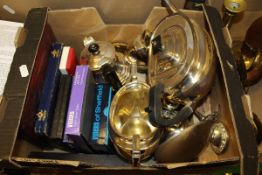 A box of assorted plated wares, to include a three-piece teaset, various cutlery, etc,