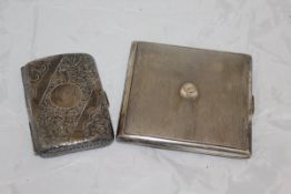 A cigarette case with engine turned decoration and stamped "Sterling 925" to interior,