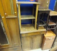 A pine cupboard with single drawer above two cupboard doors, raised on a plinth base,