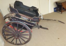 A Governess cart with black painted body and mud guards, with black leatherette upholstered seats,