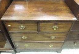 A 19th Century mahogany chest of two short over two long drawers with brass handles,