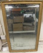 A late 19th / early 20th Century rectangular wall mirror,