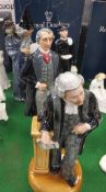 A collection of four Royal Doulton figurines to include "The Lawyer", model No.