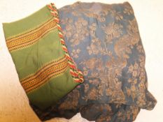 A box containing a selection of Edwardian blue and gold floral fabric,