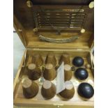 A teak cased set of Barlow and Tyrie English Garden traditional skittles and accessories