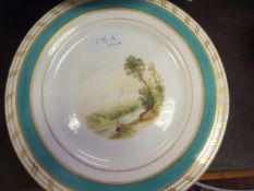 A collection of Continental porcelain cabinet plates decorated with rural scenes and with teal and