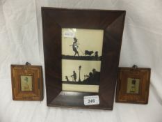 A silhouette of an elderly gentleman with a pig and another with a dog, in mahogany frame,