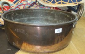 A large copper two handled jam pan CONDITION REPORTS Dent to one of the handle