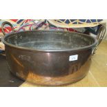 A large copper two handled jam pan CONDITION REPORTS Dent to one of the handle