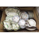 Two boxes of various china wares and a box containing a plated tea set
