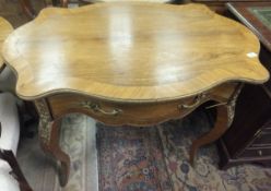 A 19th Century French kingwood and rosewood cross-banded centre table,