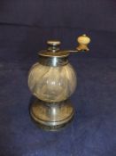 A Victorian silver mounted and glass Peugeot pepper grinder with ivory knob handle (London 1887,