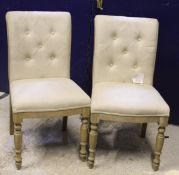 A set of six light oak framed cream upholstered dining chairs (4 plus 2 carvers)