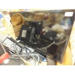 A Samsung flatscreen television, DVD player, Sony speakers,