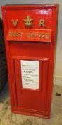 A reproduction Victorian style GPO post box with red paintwork *