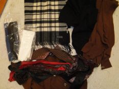 A box containing a Burberry checked wool scarf, a Burberry cashmere cardigan,