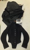 A box containing assorted black lace sections, vintage black silk and velvet skirt,