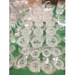 A suite of Edinburgh Crystal glass of thistle form with etched thistle decoration,