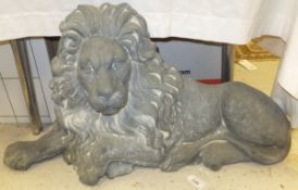 A simulated cast iron (resin) lion doorstop