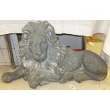 A simulated cast iron (resin) lion doorstop