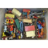 Two boxes of assorted toys to include Matchbox cars, lorries, etc,