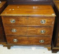 A 19th Century mahogany chest of three long graduated drawers,