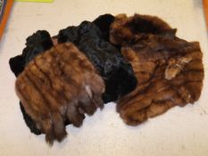 A box containing a mink fur muff, a fur stole, a fur tippet, a fur coat,