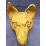 A Victorian painted iron fox mask doorstop and another doorstop as a kilted Scotsman with lance