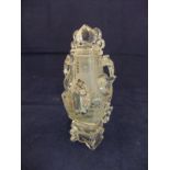 A Chinese clear cut rock crystal dressing table bottle of slab cut baluster form with ring handles