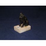 A Modernist style bronze figure of a boxer dog seated, signed "Dengg",