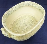 A late 19th / early 20th Century chintzware decorated pottery footbath,