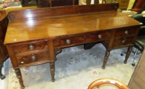A 19th Century mahogany sideboard, the galleried back above a plain top with central drawer,