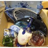 A box of miscellaneous china and glass wares to include cranberry glass dressing table jars,