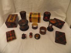 A collection of thirteen pieces of Victorian Tartan ware to include a cotton box advertising "Clark