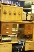 Two teak desks, three leatherette covered office chairs,