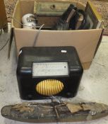 A box of miscellaneous items to include china, a bakelite cased Bush type DAV 90 radio,