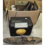 A box of miscellaneous items to include china, a bakelite cased Bush type DAV 90 radio,