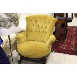 A Victorian rocking tub armchair with buttoned back,