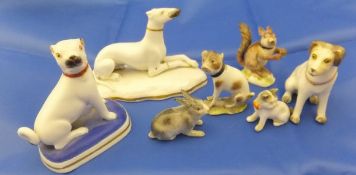 A collection of 18th Century and later porcelain figures of animals to include squirrel with collar