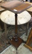 A reproduction mahogany and inlaid pedestal plant stand,