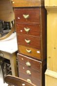Two mahogany four-drawer pedestal with bras lug handles,